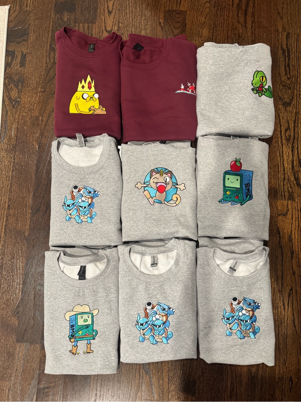 Gildan Cartoon Graphic Sweatshirts -All XL at $40 each.